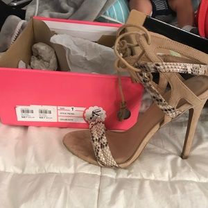 Nude and snake skin pump